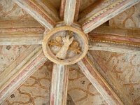 Clé de voute représentant une main bénissant